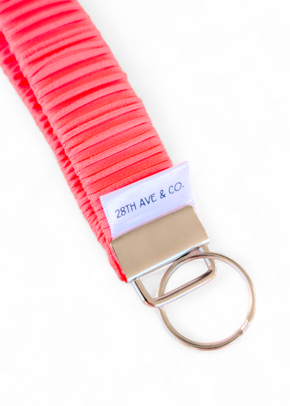 Neon Coral Wristlet