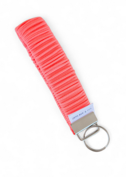 Neon Coral Wristlet
